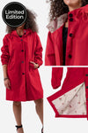 A person is shown wearing the CHERRY RED WINDBREAKER by looselyboho, a red button-up coat with an adjustable hood. This stylish windbreaker, adorned with black buttons and pockets, features close-up images of the hood and inner lining that display a charming cherry pattern. The "Limited Edition" label is prominently displayed in the top left corner.